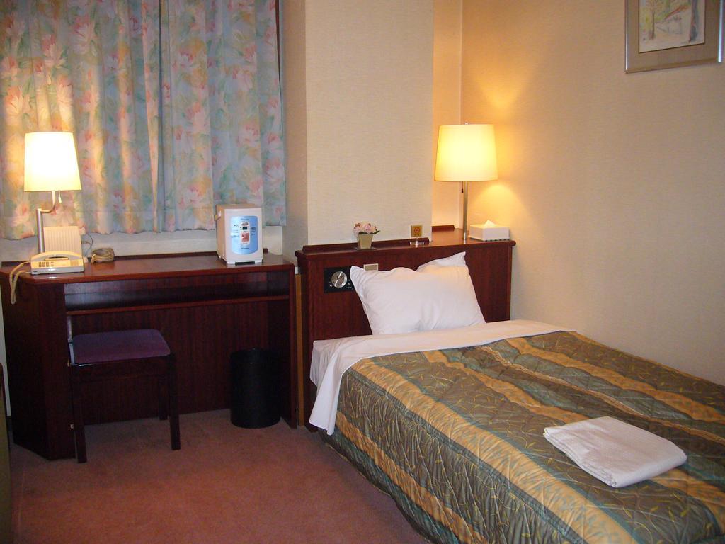 City Hotel Ikeda Okajama Szoba fotó